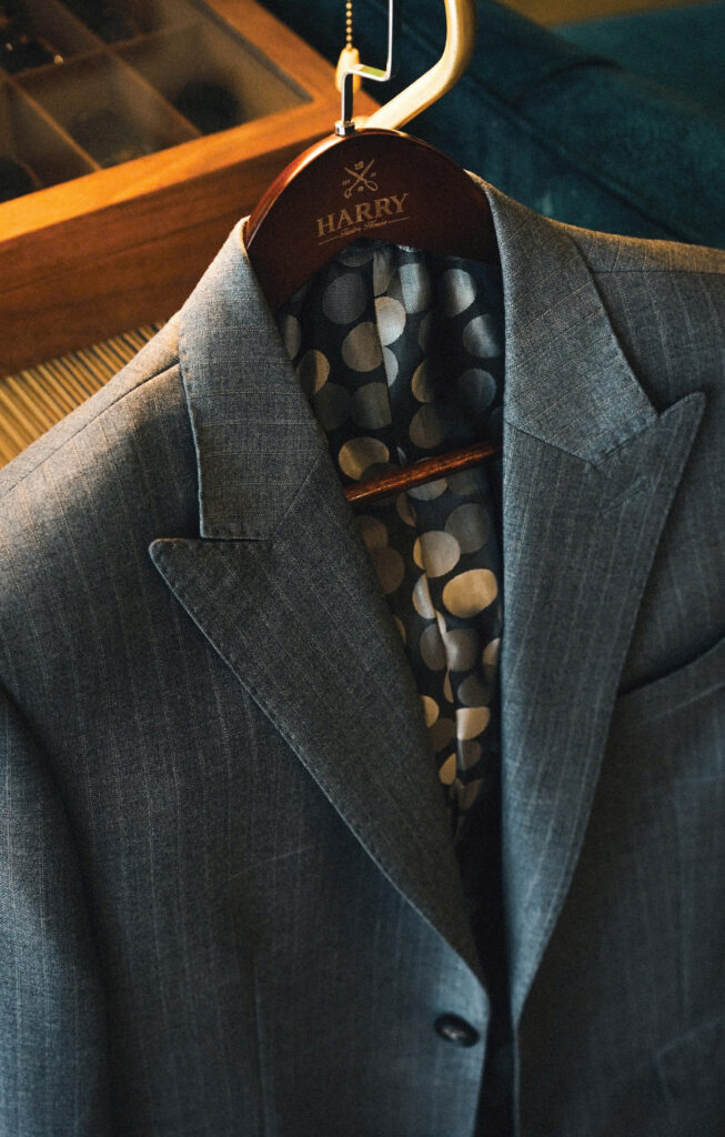 Bespoke tailoring dark grey jacket, with pinstripe pattern